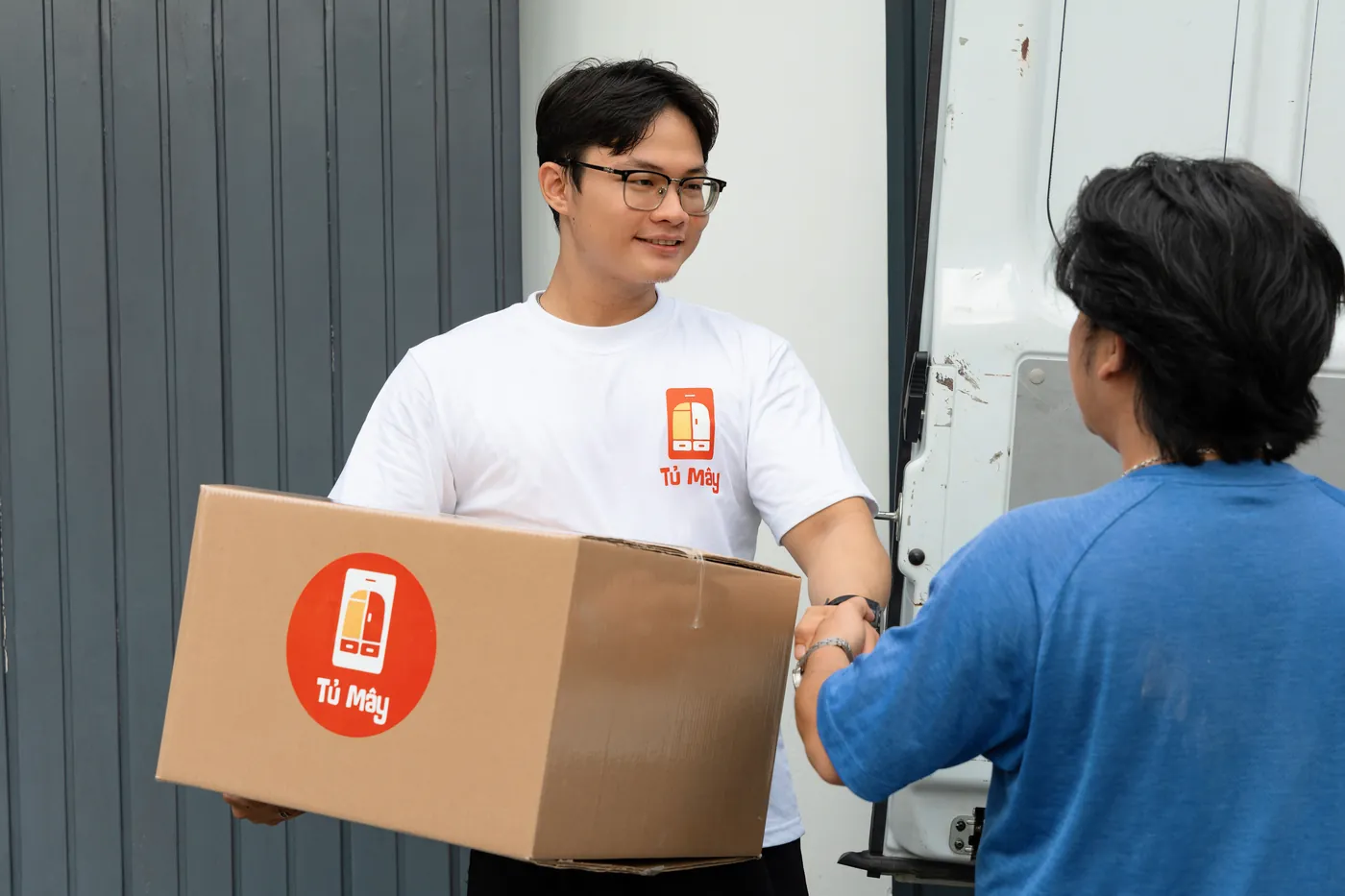 Handing a box back to a customer